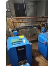A new high-efficiency boiler installed by Bright Heating and Cooling with copper piping