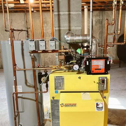 A high-efficiency System 2000 by Energy Kinetics oil boiler installed by Bright Heating and Cooling with clean copper piping