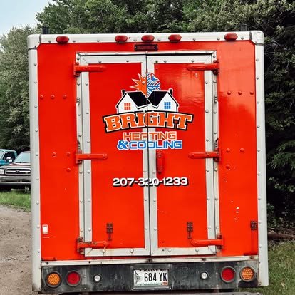 The back of the Bright Heating and Cooling service van with logo and phone number